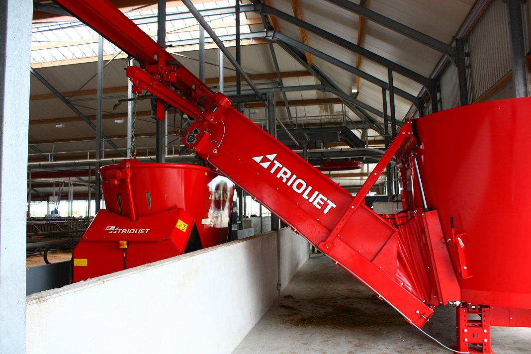 A-dairy-farmer-would-buy-a-feeding-robot-with-feed-kitchen-to-feed-his-cows